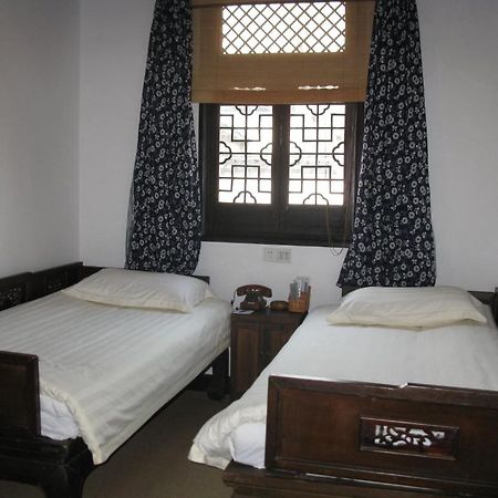 XI Di Travel Lodge Yi (Anhui) Номер фото